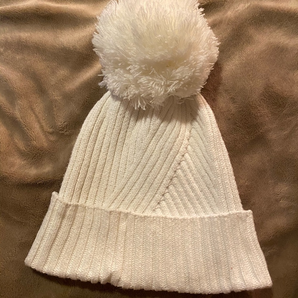 White beanie with puff top from Target